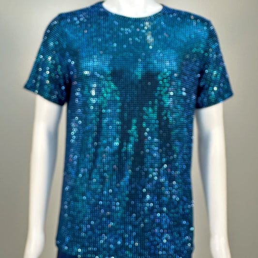 Blurred view of Capri Blue Crystals on Black Fabric T-shirt demonstrating how the garment sparkles in videos.