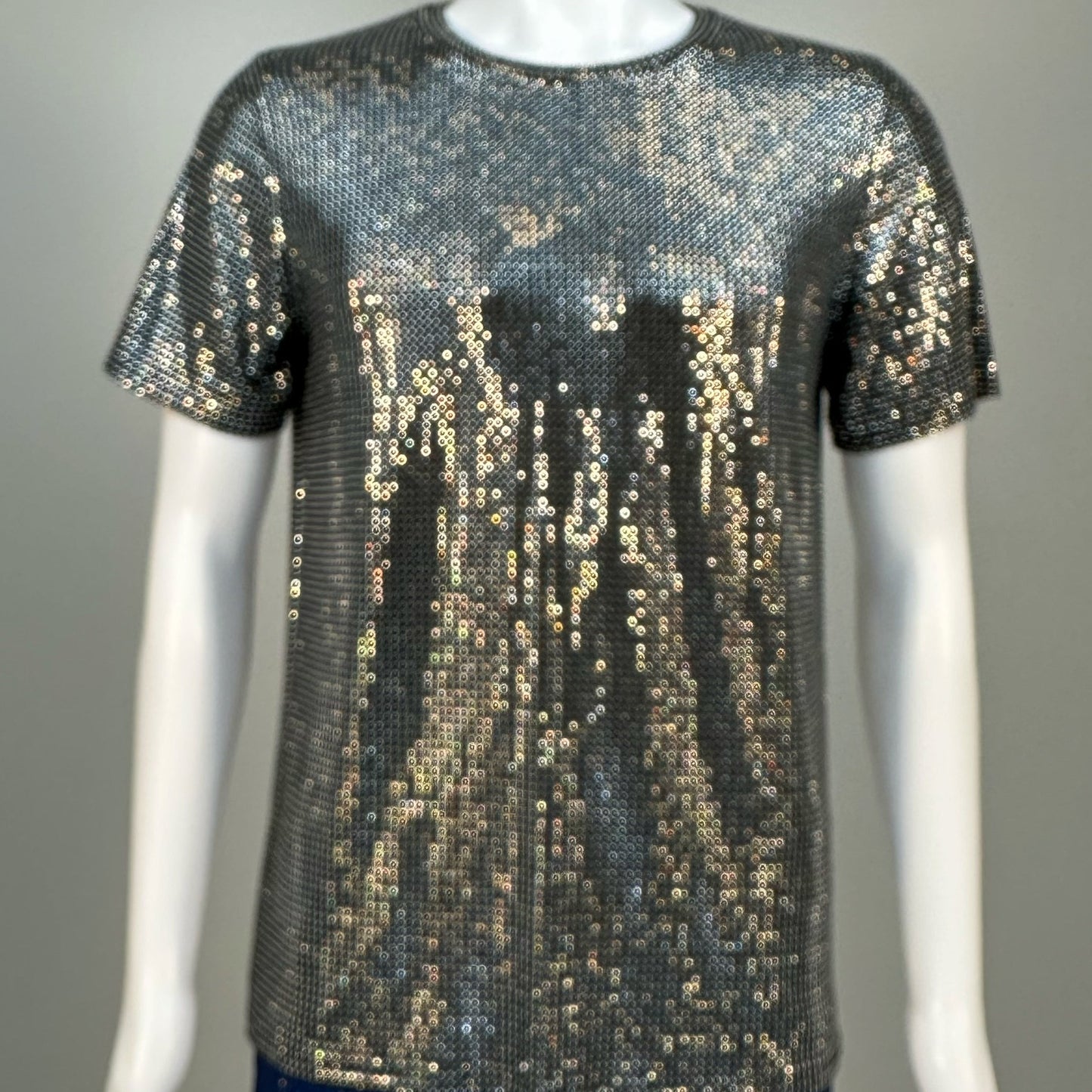 Blurred view of Clear Crystals on Black Fabric T-shirt demonstrating how the garment sparkles in videos.