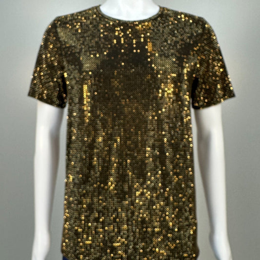Blurred view of Gold Aurum Crystals on Black Fabric T-shirt demonstrating how the garment sparkles in videos.