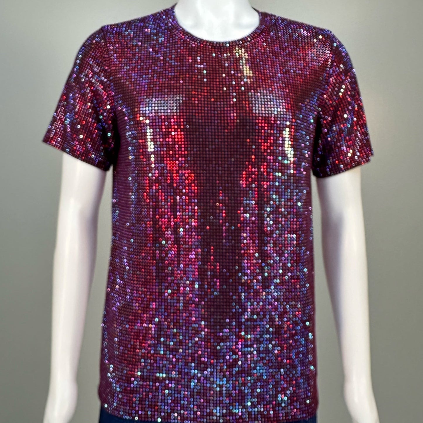 Blurred view of Lt. Siam AB Crystals on Black Fabric T-shirt demonstrating how the garment sparkles in videos.