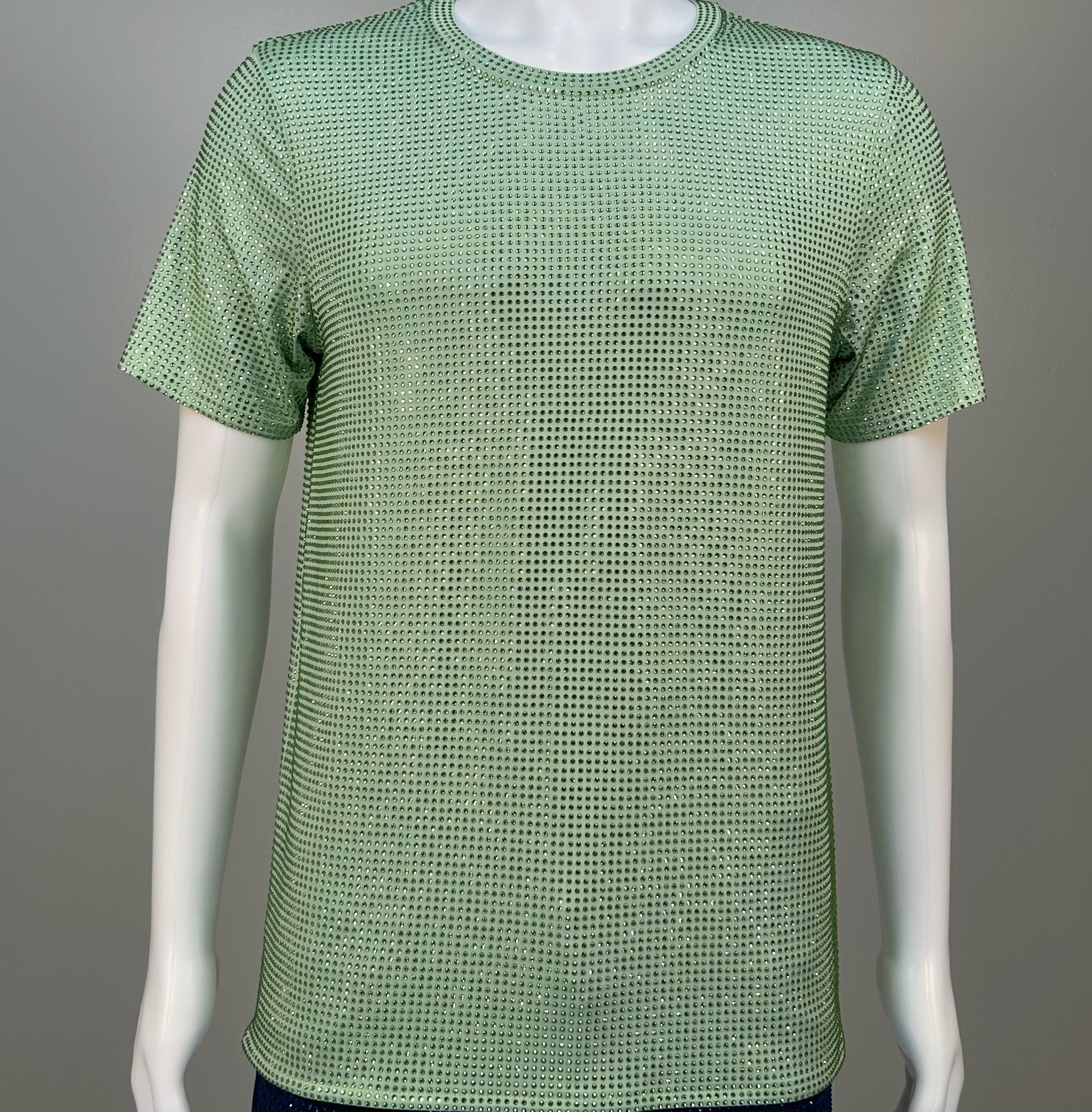 Photo of a sparkling Lt. Green Crystals on Lt. green Fabric T-shirt featuring thousands of crystal rhinestones.