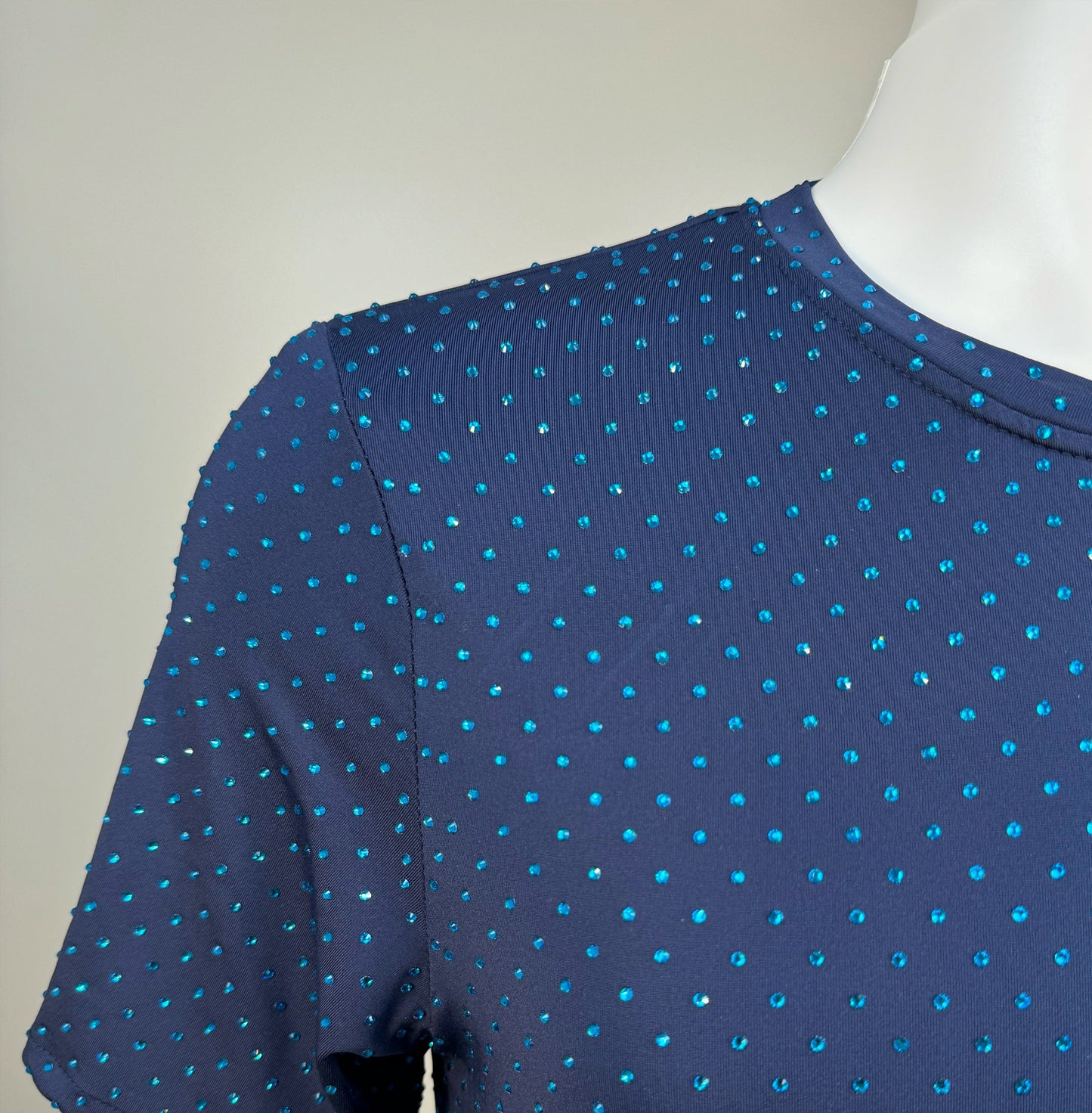 Shoulder detail of Capri Blue Crystals on Navy Fabric Dotted T-shirt revealing the impeccable construction of this complex garment.
