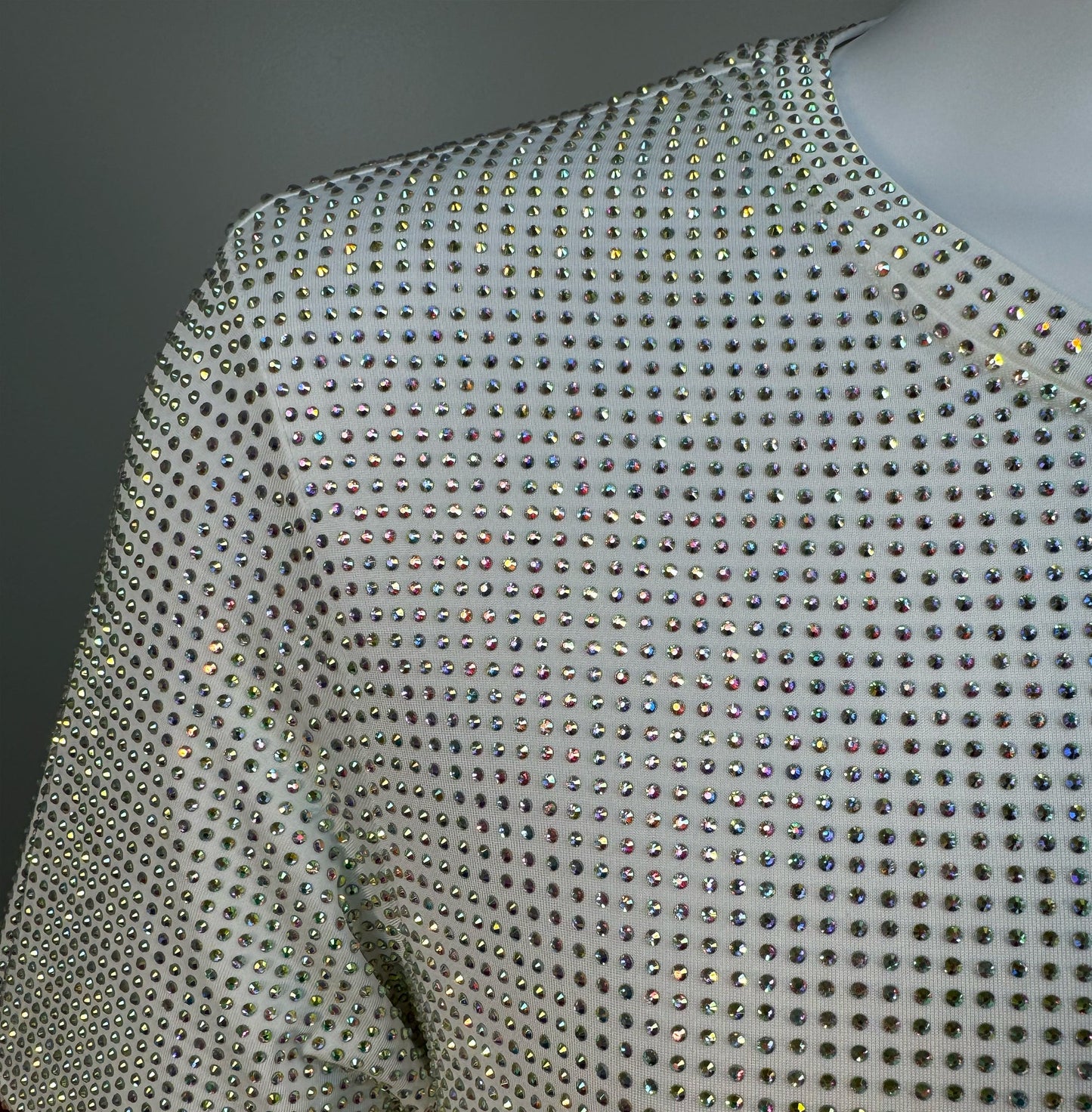 Shoulder detail of Clear AB Crystals on White Fabric T-shirt revealing the impeccable construction of this complex garment.
