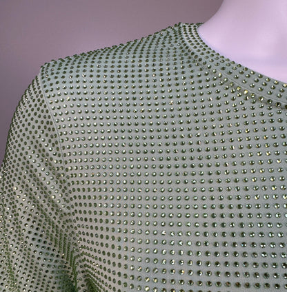 Shoulder detail of Lt. Green Crystals on Lt. green Fabric T-shirt revealing the impeccable construction of this complex garment.